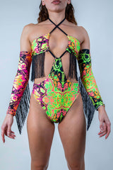 Intensity Twist Bodysuit with Fringe in vibrant UV colors, perfect for rave outfits, featuring a twist top and cheeky design.