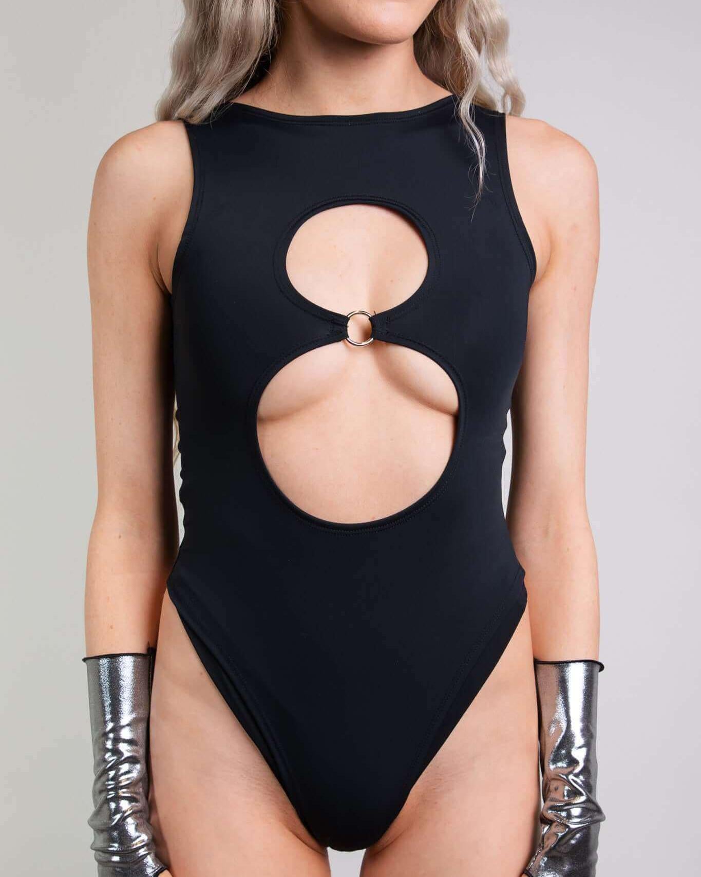 Matte black keyhole bodysuit with side cutouts and O-ring detail, perfect for rave outfits.