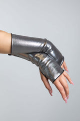 A photo of a woman's hands wearing chrome gloves.