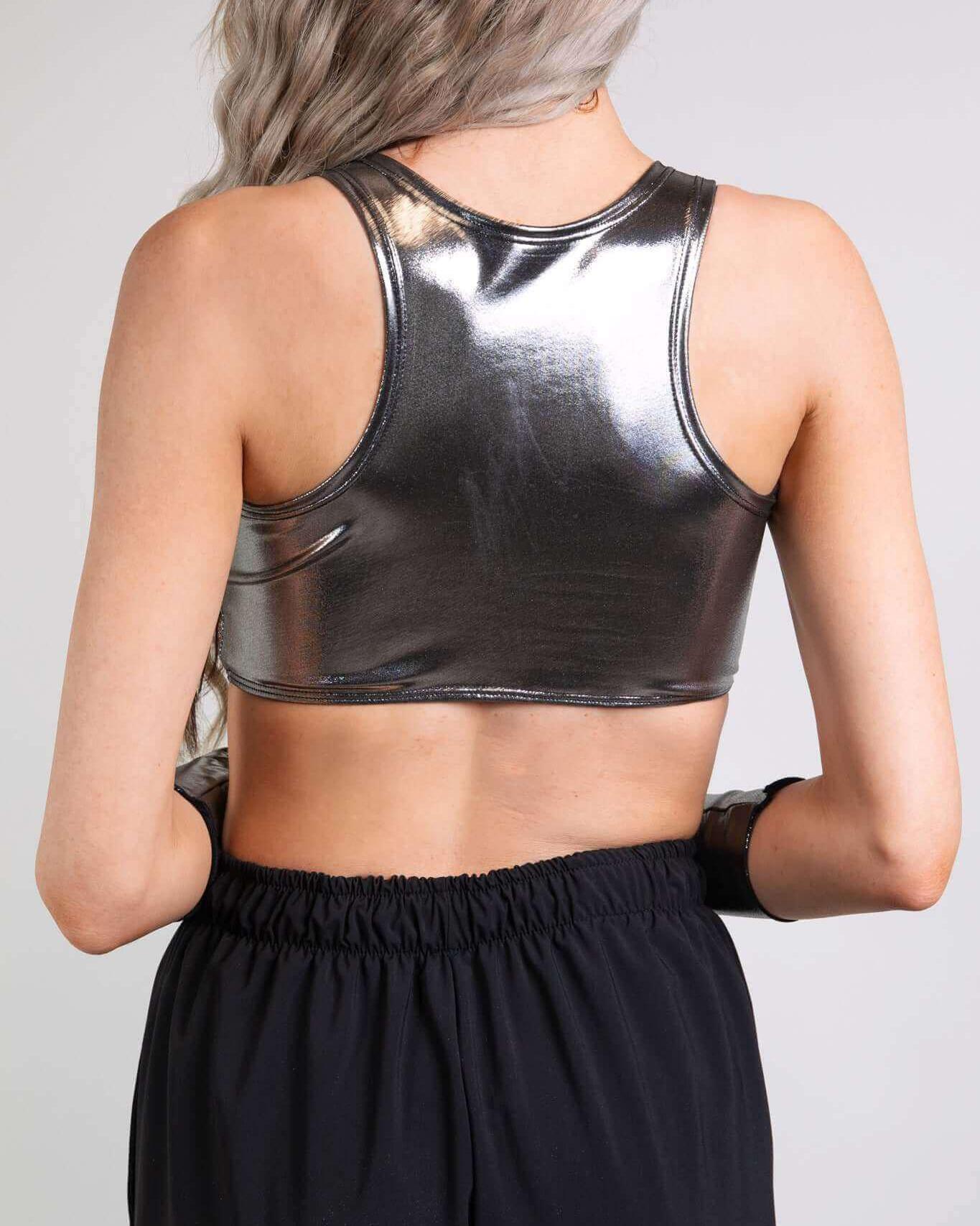 Back view of the Chrome Keyhole Top with keyhole cutout, perfect for rave outfits and featuring a shiny metallic finish.