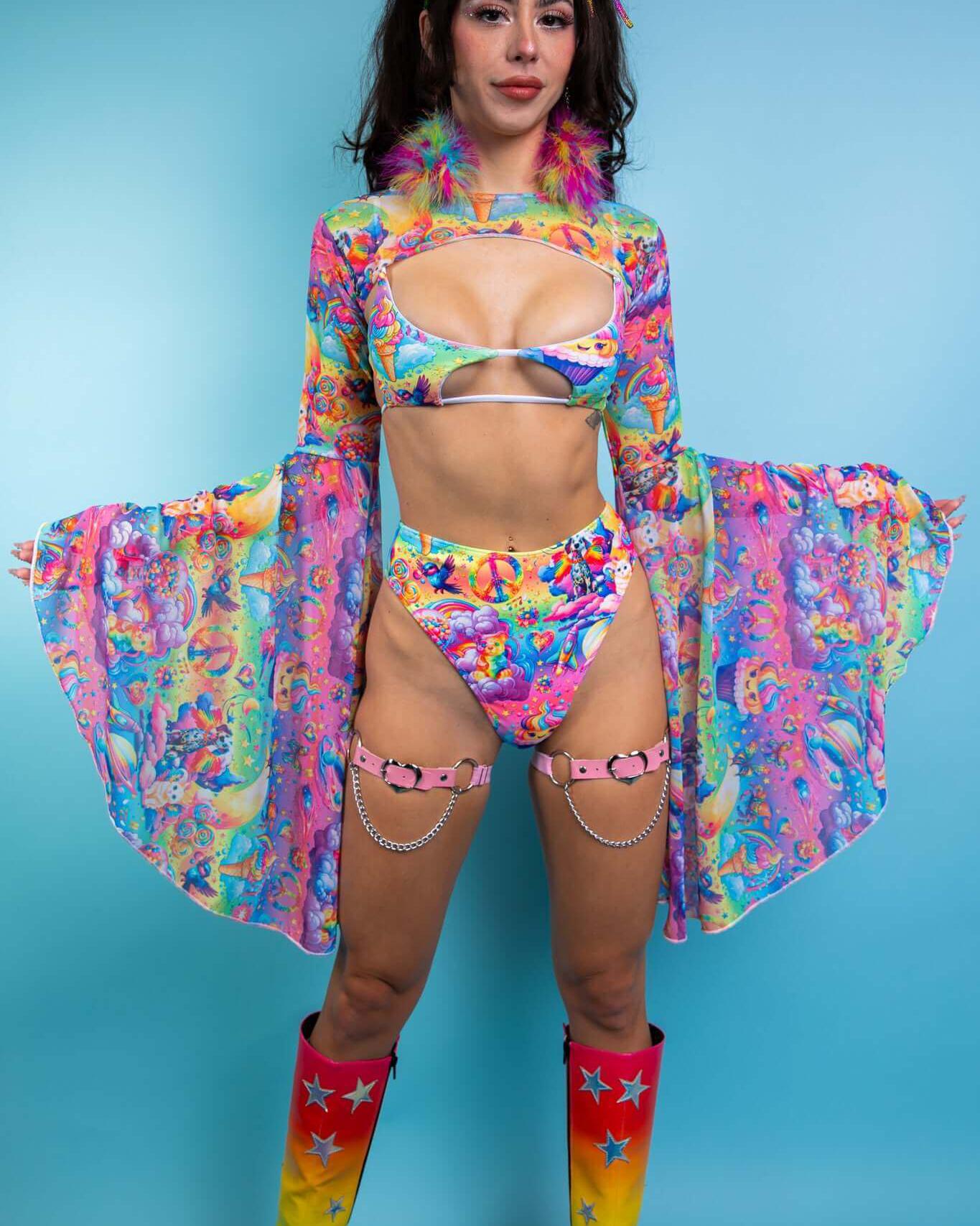 Model wearing colorful Kosmic Mesh Bell Sleeves with matching rave outfit, showcasing an ethereal style perfect for festivals.