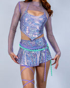 Lavender Holo Micro Skater Skirt – front view on model with long sleeve matching top, holographic rave mini skirt outfit
