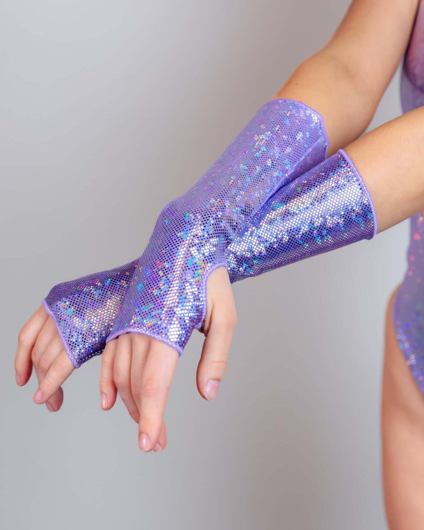 Sparkly lavender gloves with thumb holes, perfect for rave outfits and brightening up your festival look.