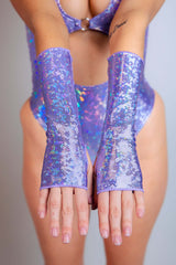 Model showcases lavender sparkling gloves with a sequined texture, part of the Freedom Rave Wear collection