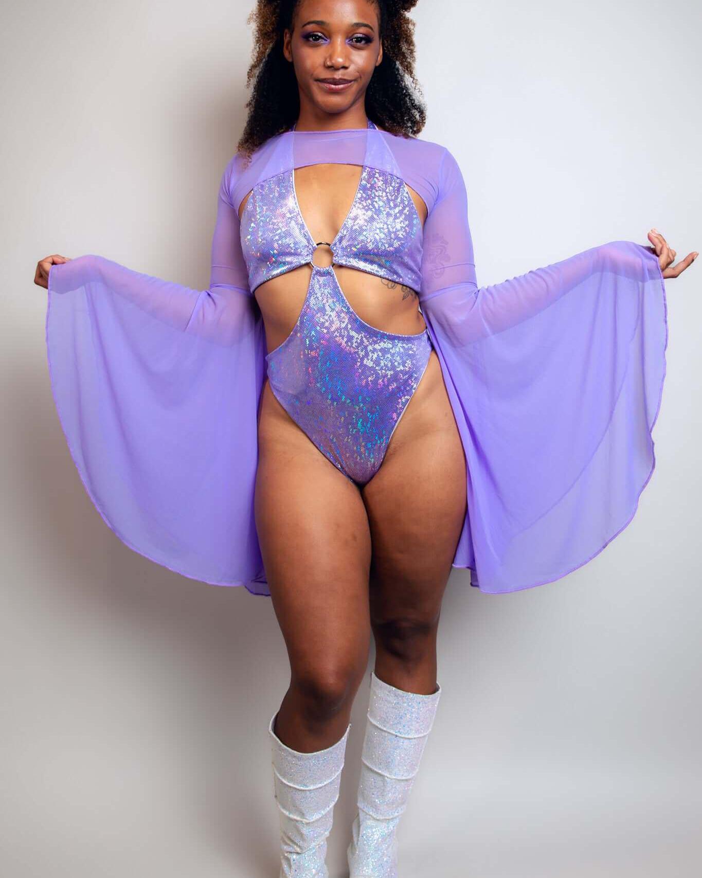 Model showcasing lavender mesh bell sleeves with a sparkly bodysuit, perfect for rave outfits and festival fashion.