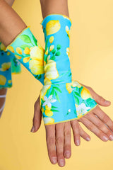 Lemon Drop Gloves in vibrant floral design, perfect for rave outfits, showcasing thumb holes and wrist-length coverage.