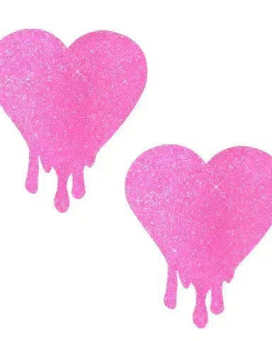 Light pink glitter melty heart nipple cover pasties for rave outfits and fun fashion emergencies.