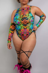 Front view of a vibrant Freedom Rave Wear bodysuit with colorful psychedelic patterns, paired with black strappy details