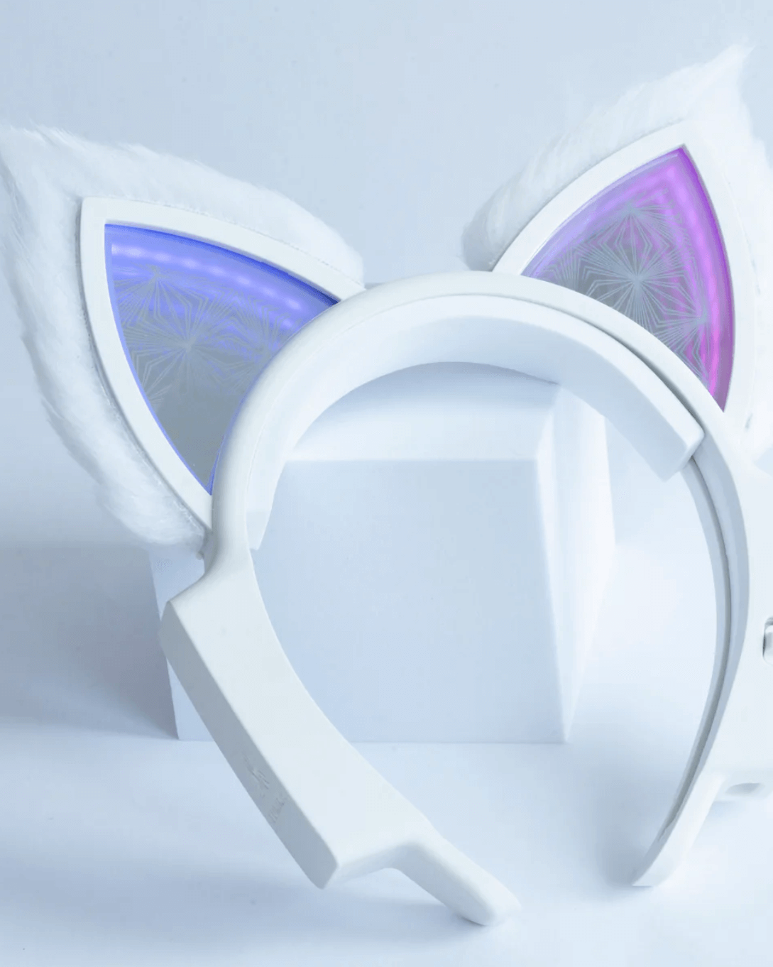 Angled view of Lumira Infinity Mirror Cat Ears showcasing their glowing LED and mirrored effect.