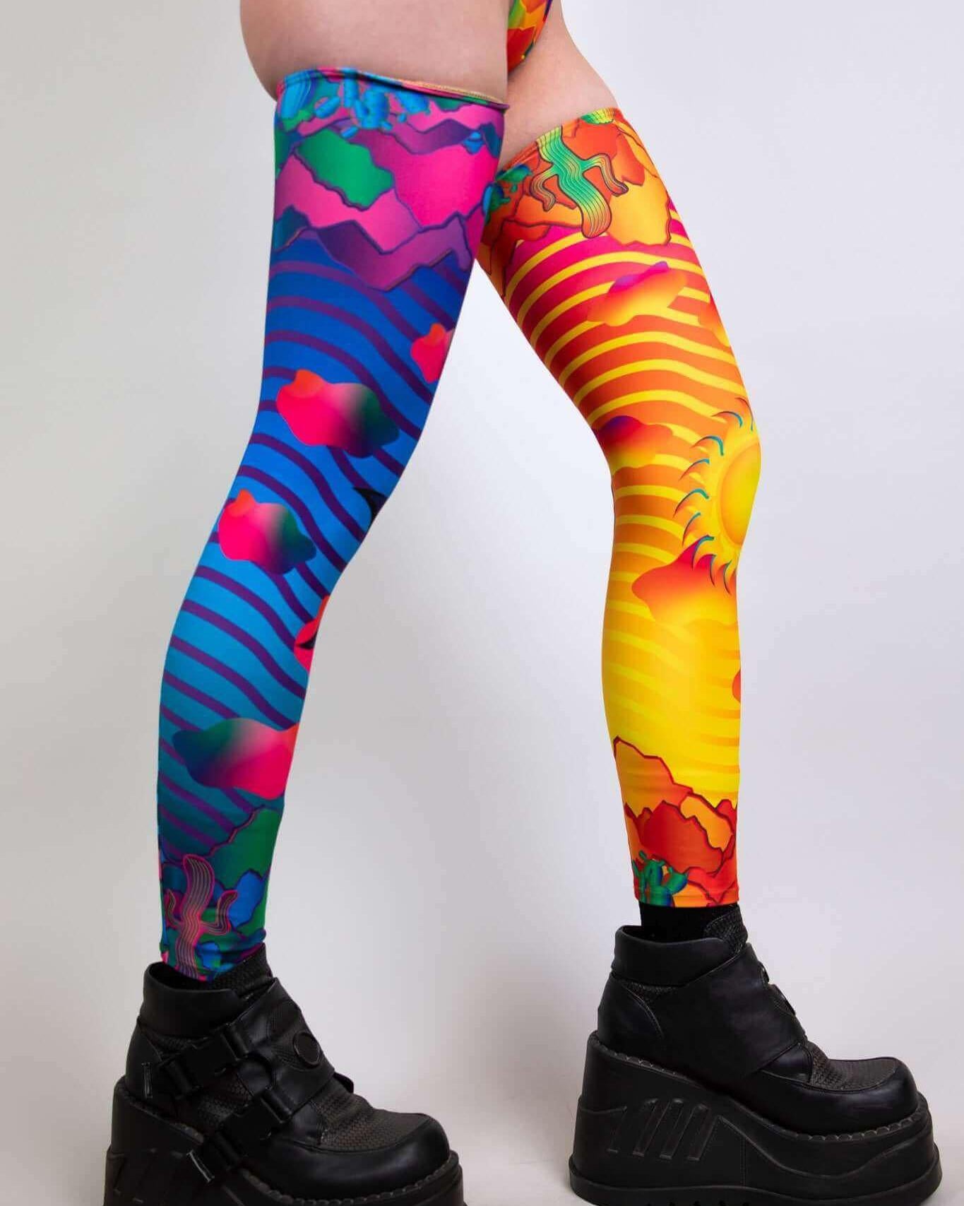 Colorful Mirage Leg Sleeves in vibrant patterns, perfect for rave outfits and festival fashion.