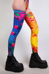 Vibrant Freedom Rave Wear leg sleeves showcasing bold, multi-colored prints for a dazzling festival look.