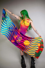 Colorful Freedom Rave Wear scarf showcased by a woman with striking green hair, accentuating the vivid patterns