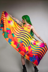 Vibrant Freedom Rave Wear scarf modeled by a woman, her green hair enhancing the flowing, colorful design