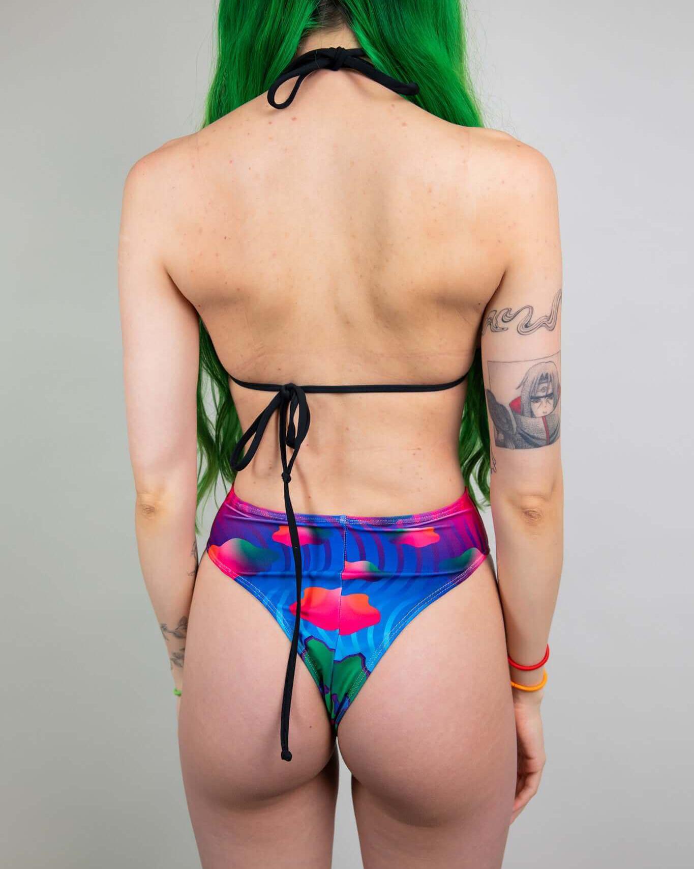 Back view of a colorful bikini, showcasing strappy details and vibrant floral design, perfect for rave outfits.