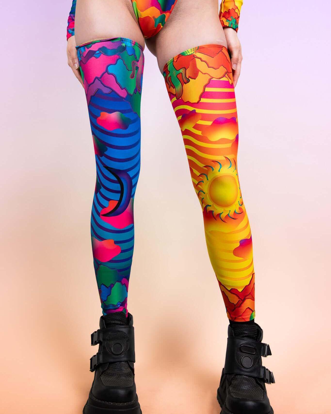 Vibrant Mirage Leg Sleeves in colorful patterns, perfect for rave outfits, featuring a thigh-high fit and stylish design.