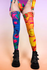 Eye-catching Freedom Rave Wear leg sleeves in a psychedelic pattern, perfect for a standout rave outfit.