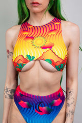 Freedom Rave Wear's halter neck teaser top with a vibrant, psychedelic pattern, ideal for festival fashion and rave enthusiasts.
