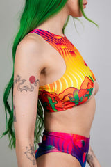 Freedom Rave Wear's colorful halter teaser top, featuring bold, psychedelic prints, perfect for standout rave outfits.