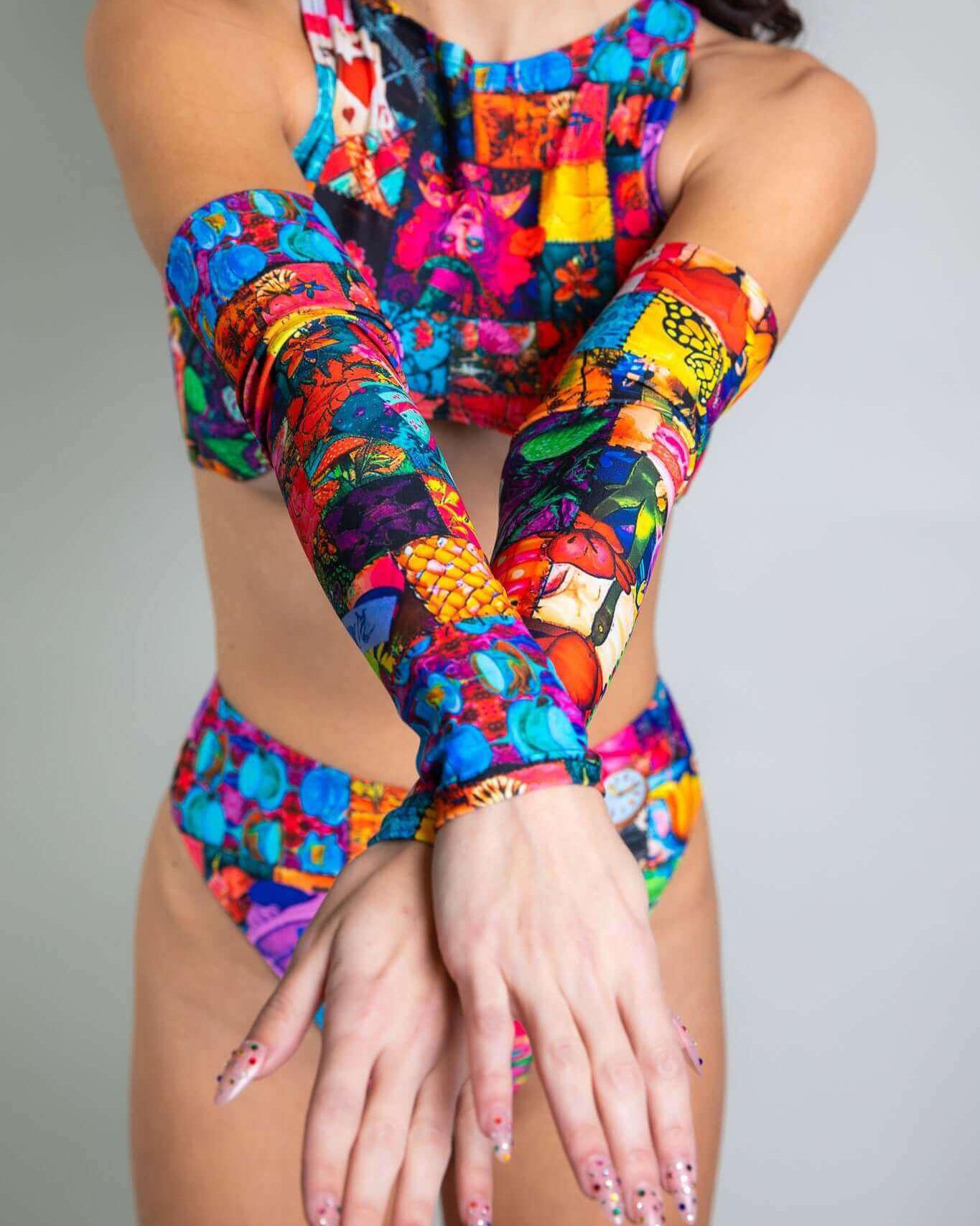 Colorful Madness Arm Sleeves paired with a matching rave outfit, perfect for enhancing festival attire.