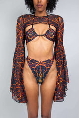 Freedom Rave Wear lava print rave bikini set with a mesh bell-sleeve top. A bold, fiery look perfect for rave events and festivals.