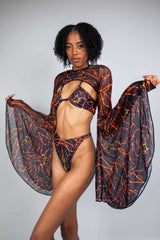 Freedom Rave Wear lava print rave bikini with a sheer bell-sleeve top. This fiery set is perfect for standing out at festivals and raves.