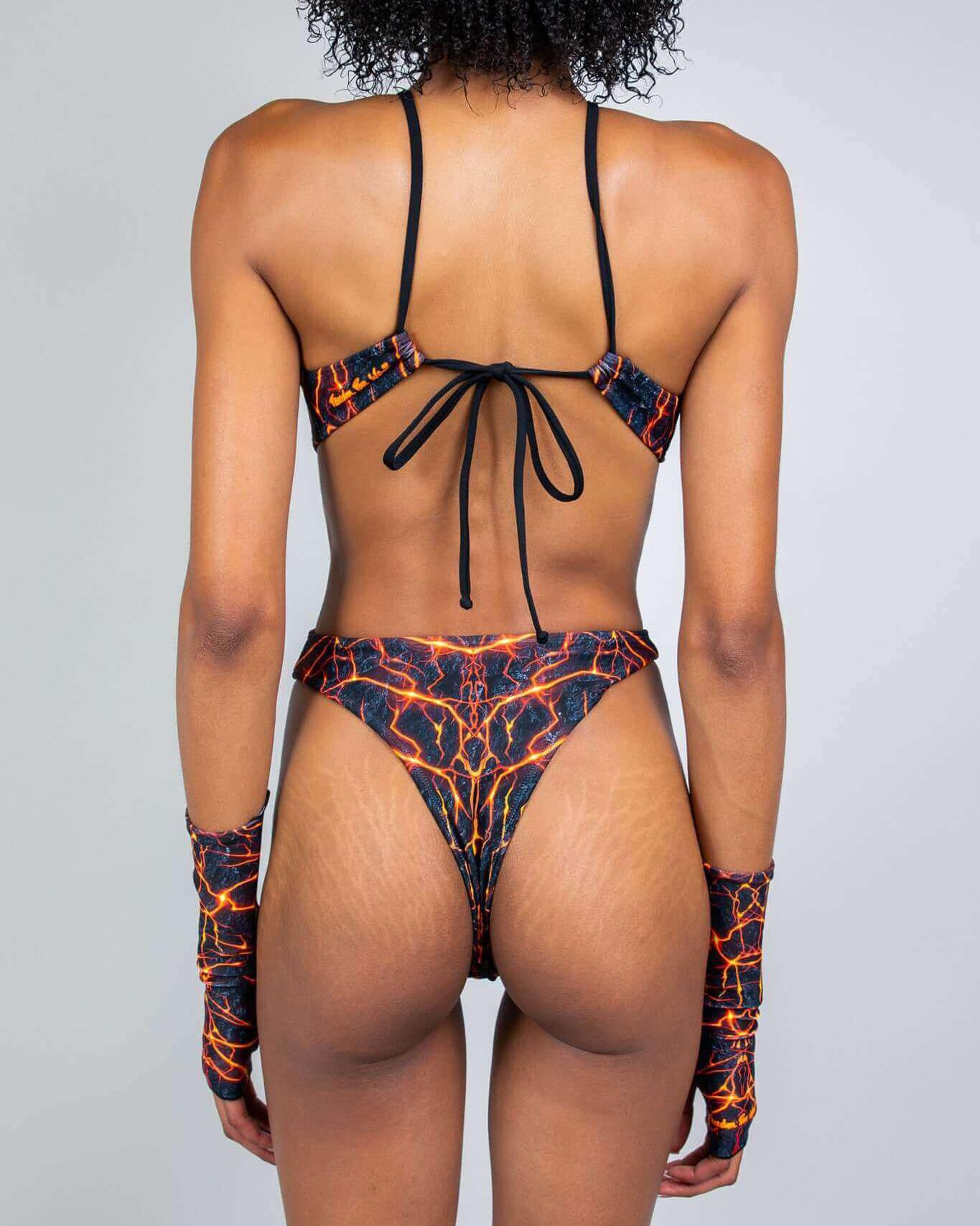 Back view of the Magma Halo Bodysuit showcasing high-hip cutout design and adjustable straps, perfect for rave outfits.