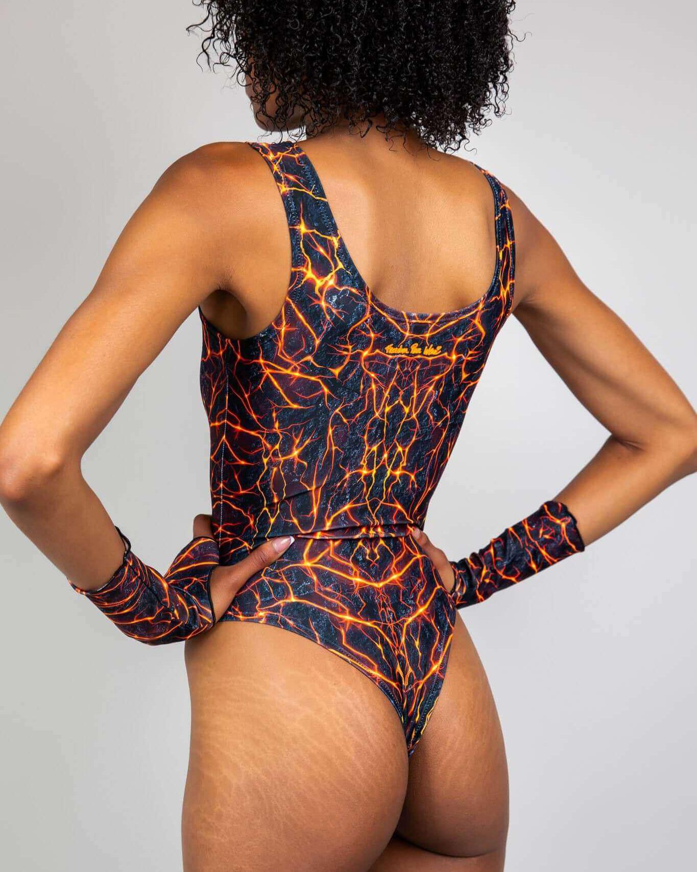 Model wearing Magma High Neck Bodysuit with fiery lava design, perfect for rave outfits and dance floor style.