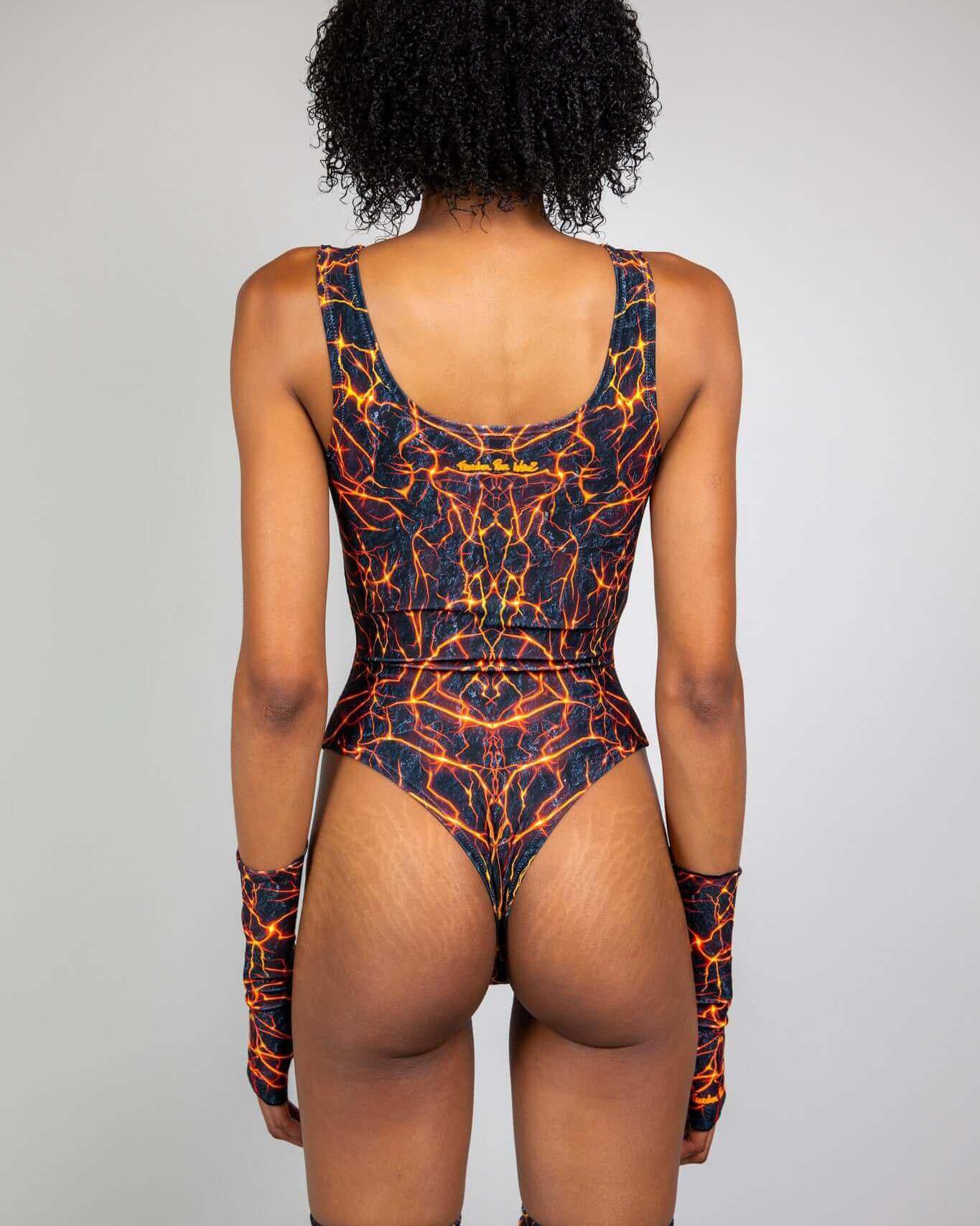 Model wearing the Magma High Neck Bodysuit, showcasing a vibrant lava pattern and high hip design, perfect for rave outfits.