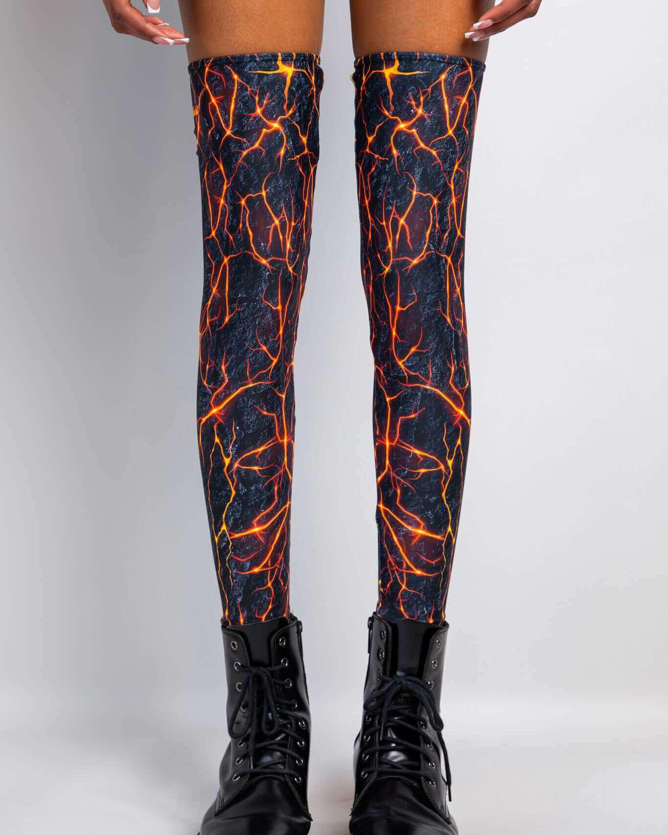 Magma Leg Sleeves in fiery design, perfect for rave outfits, showcasing over-the-knee fit and form-fitting style.