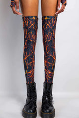 Magma Leg Sleeves in fiery design, perfect for rave outfits, showcasing over-the-knee fit and form-fitting style.