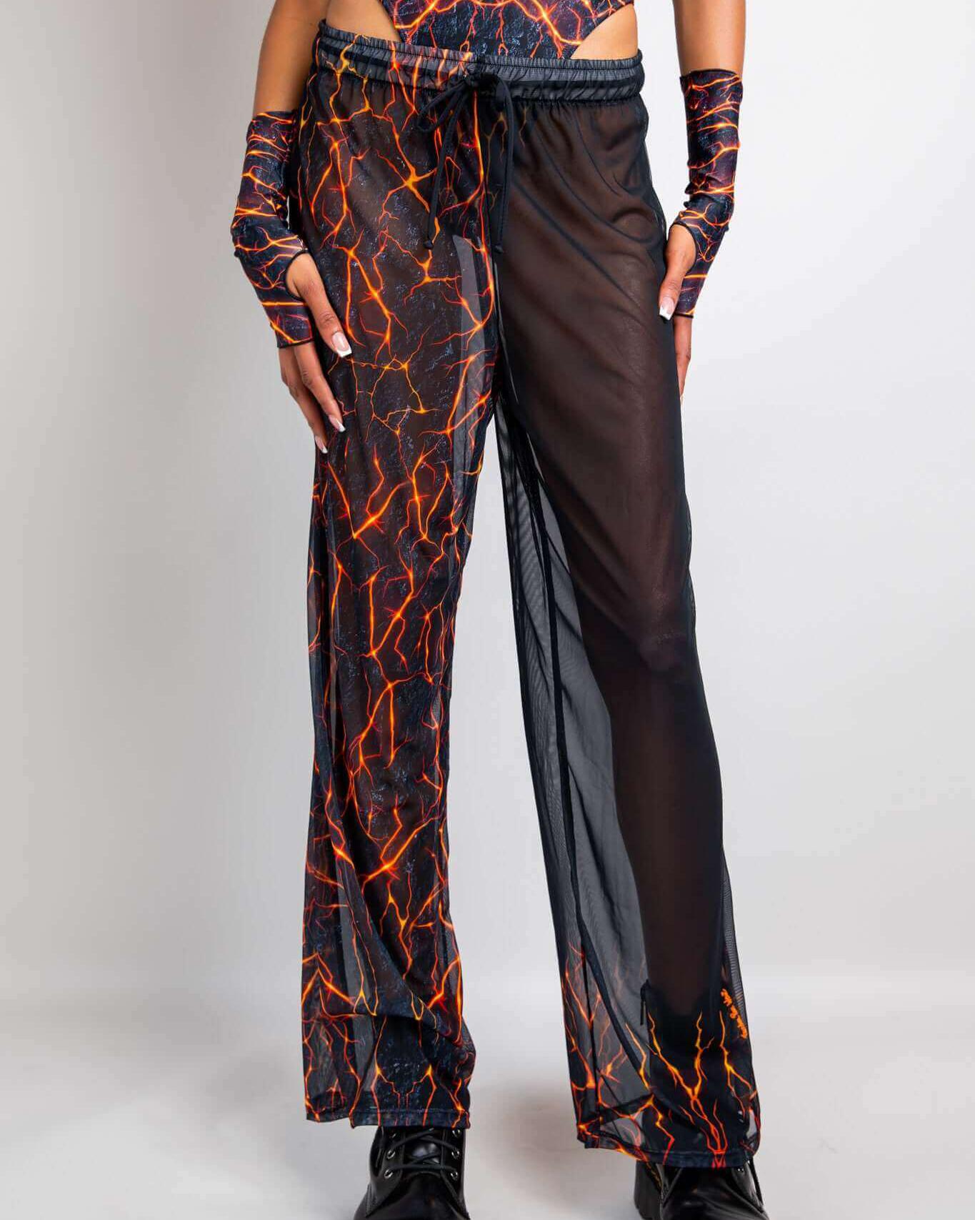 Sizzling Magma Mesh Lucy Pants with fiery lava print and breathable design, perfect for rave outfits and dancing all night.