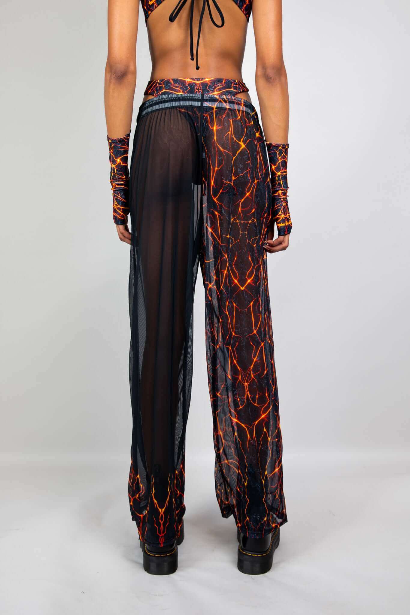 Freedom Rave Wear sheer pants in a striking lava print with side slits. Includes matching arm sleeves for a coordinated rave outfit.