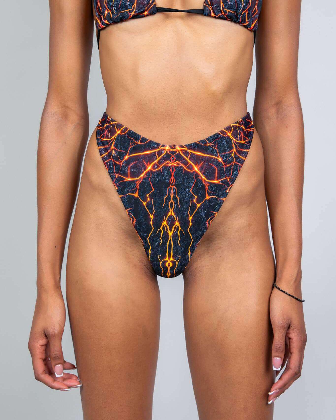 Magma Retro Thong Bottoms featuring vibrant lava rave print, perfect for standout rave outfits.