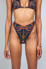 Magma Retro Thong Bottoms featuring vibrant lava rave print, perfect for standout rave outfits.