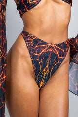 Magma Retro Thong Bottoms with vibrant lava rave print, perfect for stylish rave outfits and parties.