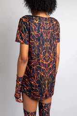 Magma Unisex T-Shirt showcasing vibrant lava design, perfect for rave outfits and dance floor fun.