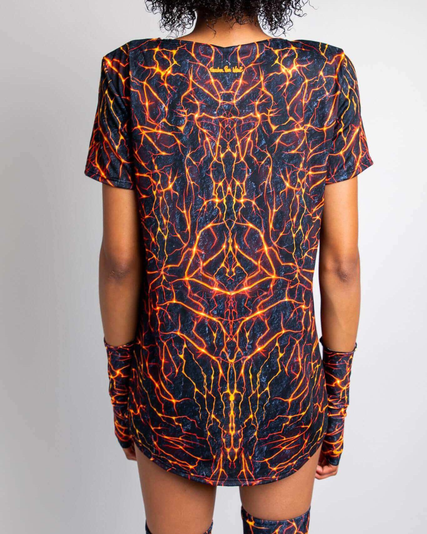 Back view of a person wearing a Magma Unisex T-Shirt with a lava rave design, showcasing its vibrant colors and unique style.