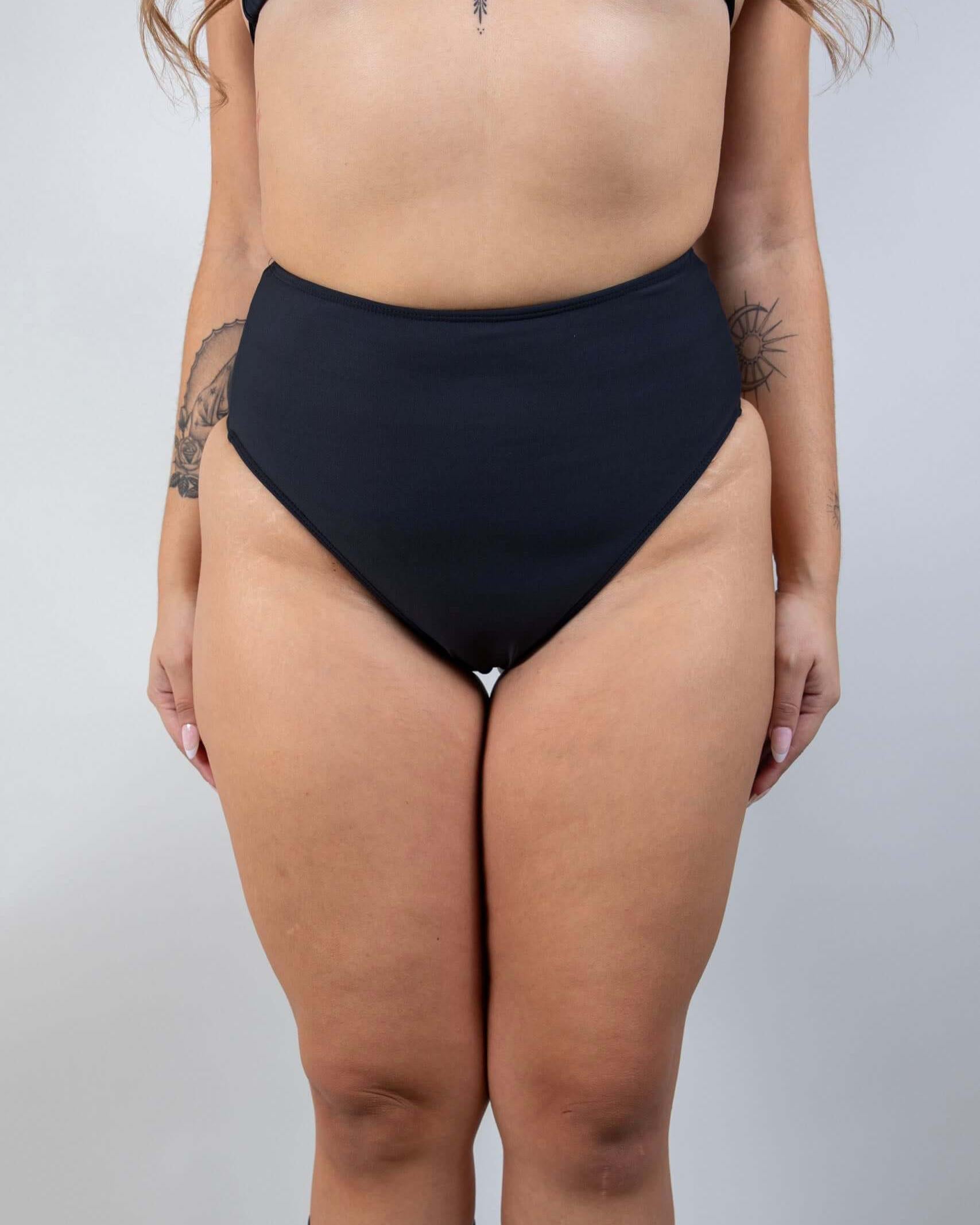 Front view of Matte Black High Waisted Bikini Bottoms featuring a sleek, full-coverage design.