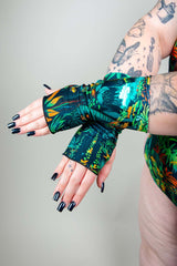 Mesozoic Gloves featured on a model, showcasing vibrant tropical design perfect for rave outfits.