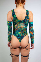 Mesozoic Slit Sideboob Bodysuit with leg straps and jungle print, perfect for rave outfits.