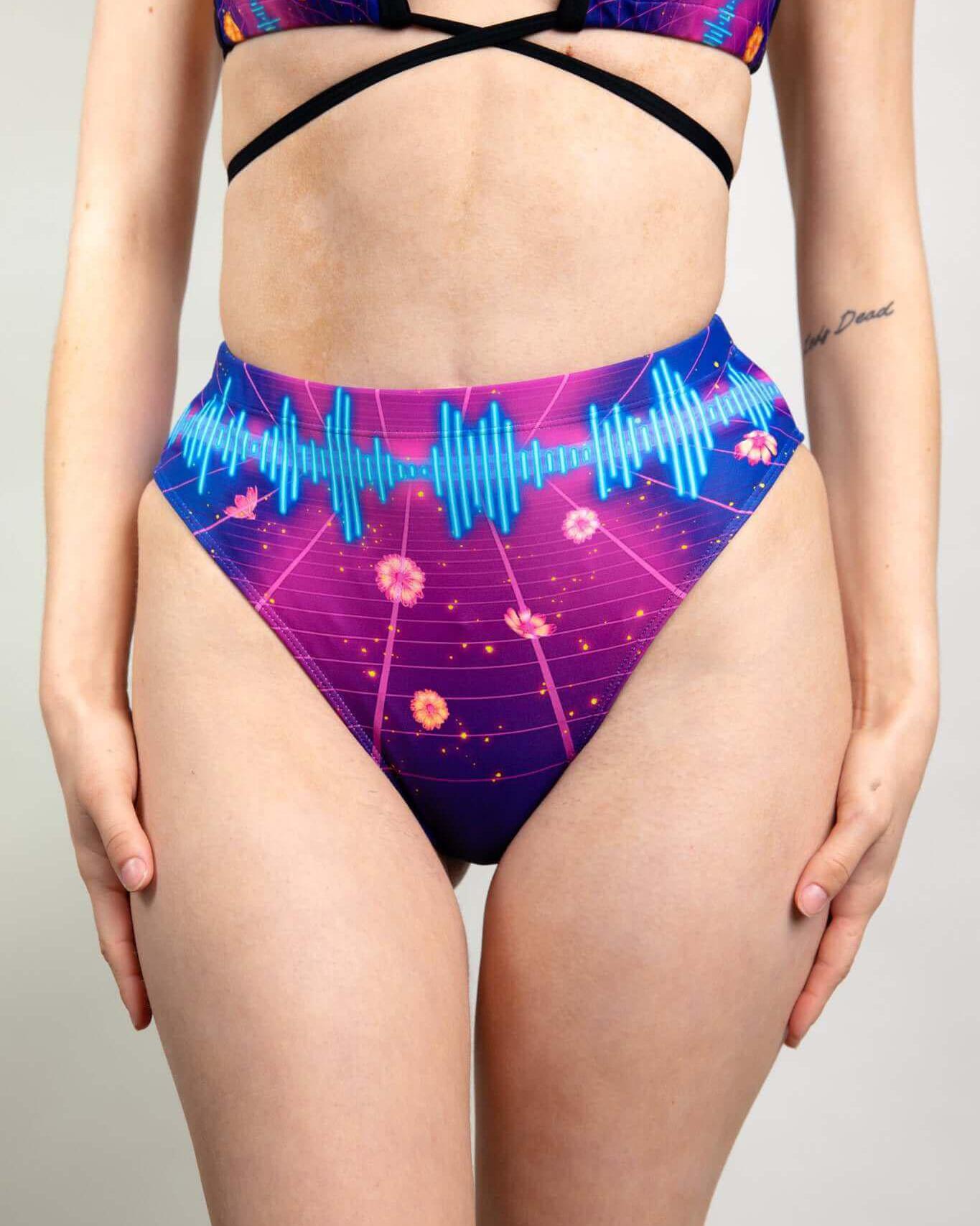 Neon Nights High Waisted Brazilian Bottoms featuring a vibrant soundwave graphic, perfect for rave outfits.