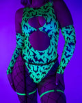 OG Batty Keyhole Bodysuit - UV Green featuring keyhole cutouts and bat print under blacklight.