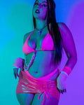 Model showcasing the Peony Bikini Top in neon pink, perfect for rave outfits and vibrant summer style.
