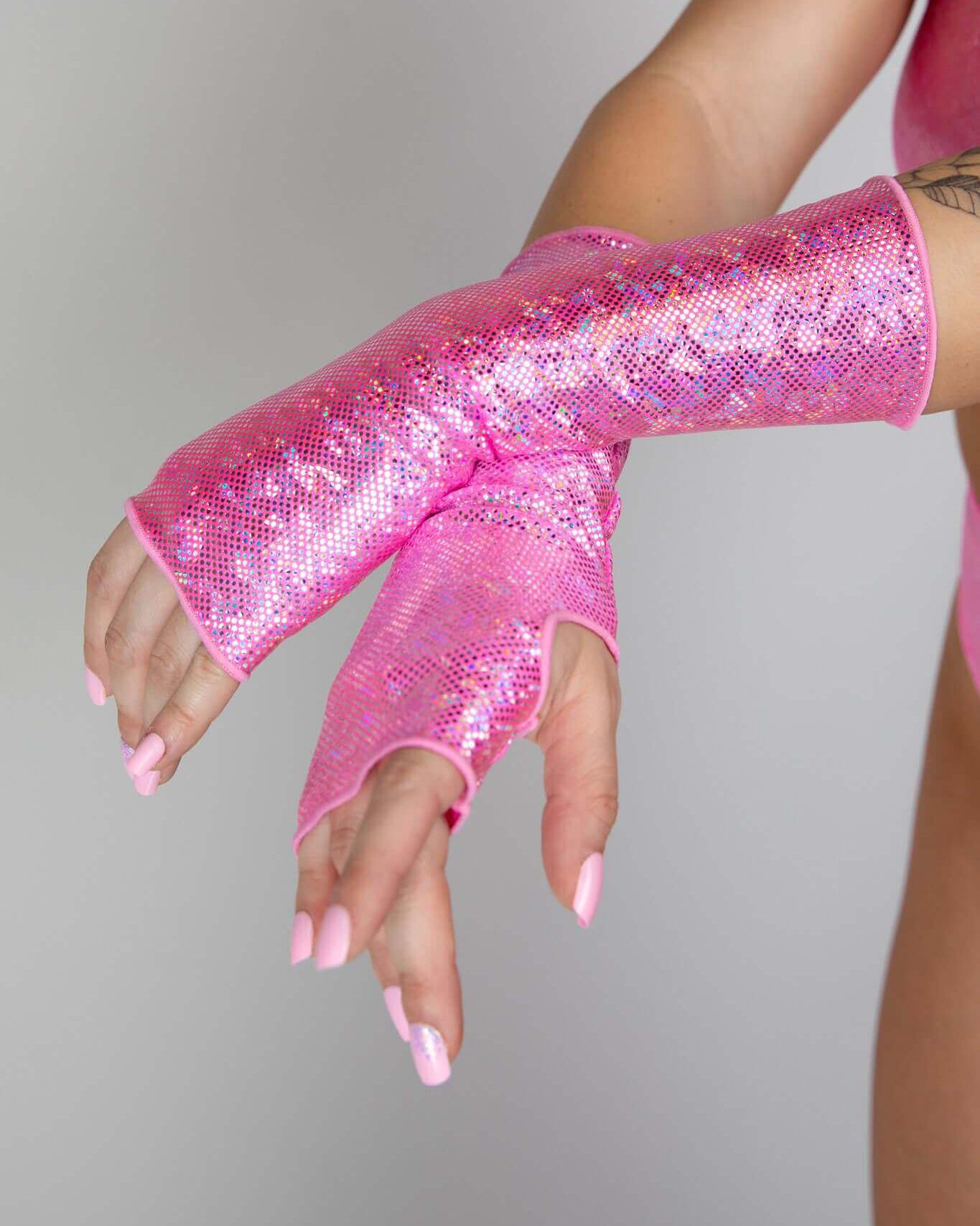 Bubble Gum Holo Gloves on model showcasing pink, shimmering design, perfect for rave outfits and festival wear.