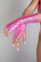 Bubble Gum Holo Gloves on model showcasing pink, shimmering design, perfect for rave outfits and festival wear.