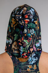 Back view of Poison Assassin Hood with a bold, vibrant abstract design on black fabric.