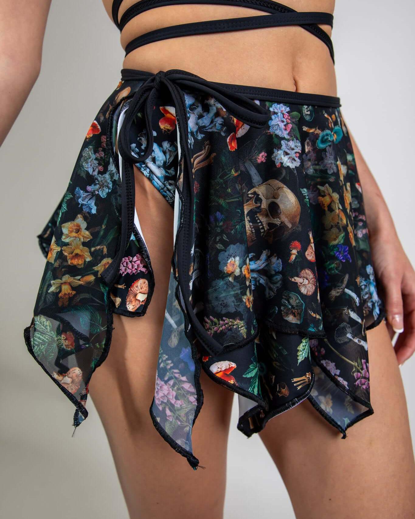 Flowing Poison Fairy Skirt with skull and floral print, perfect for rave outfits and festivals.