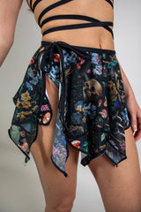 Flowing Poison Fairy Skirt with skull and floral print, perfect for rave outfits and festivals.