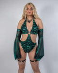 Green metallic Predator O-Ring rave bodysuit with cutout design and flowing sleeves on model front view