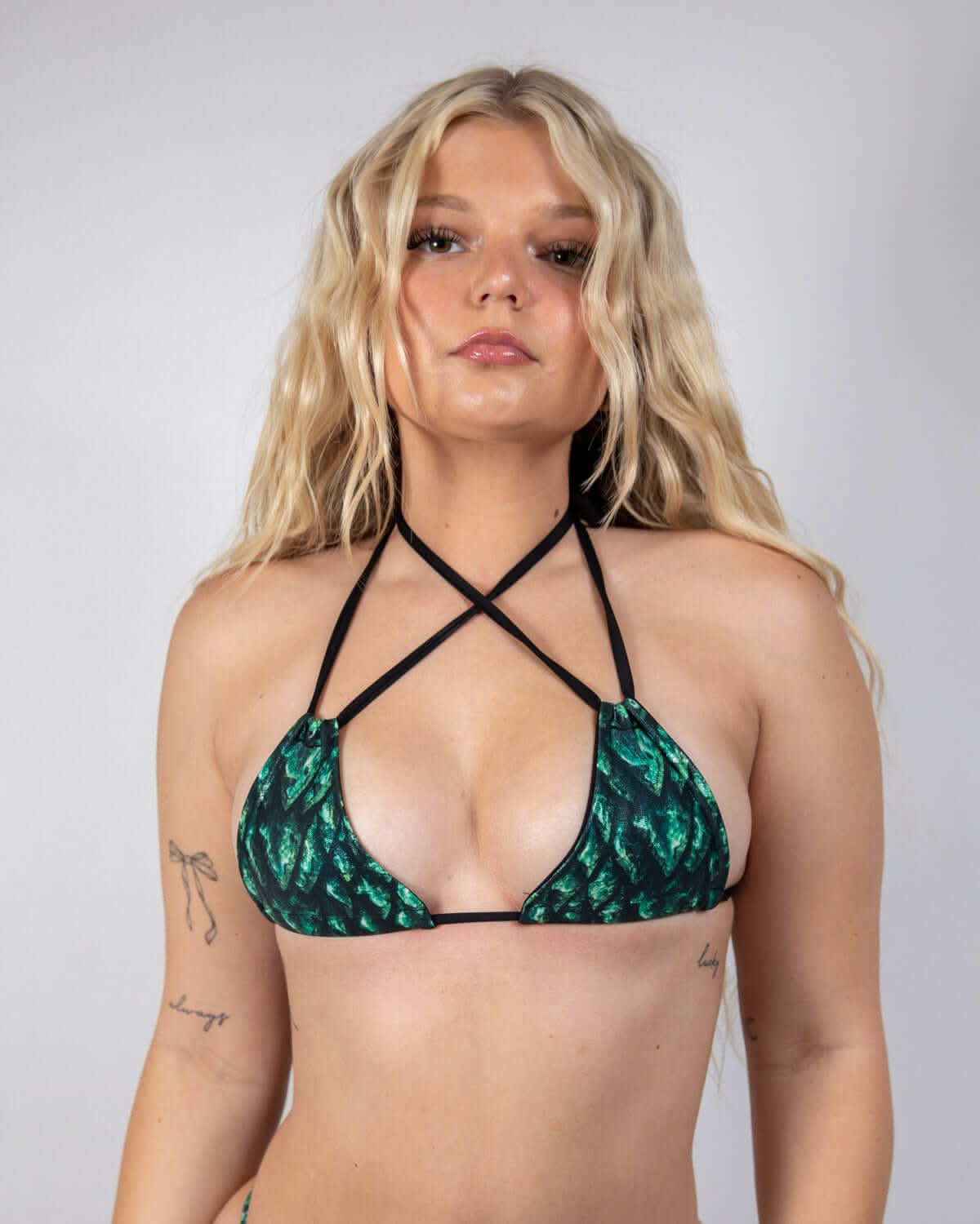 Predator Strappy Bikini Top in green scales, featuring bold straps, perfect for rave outfits and beach parties.